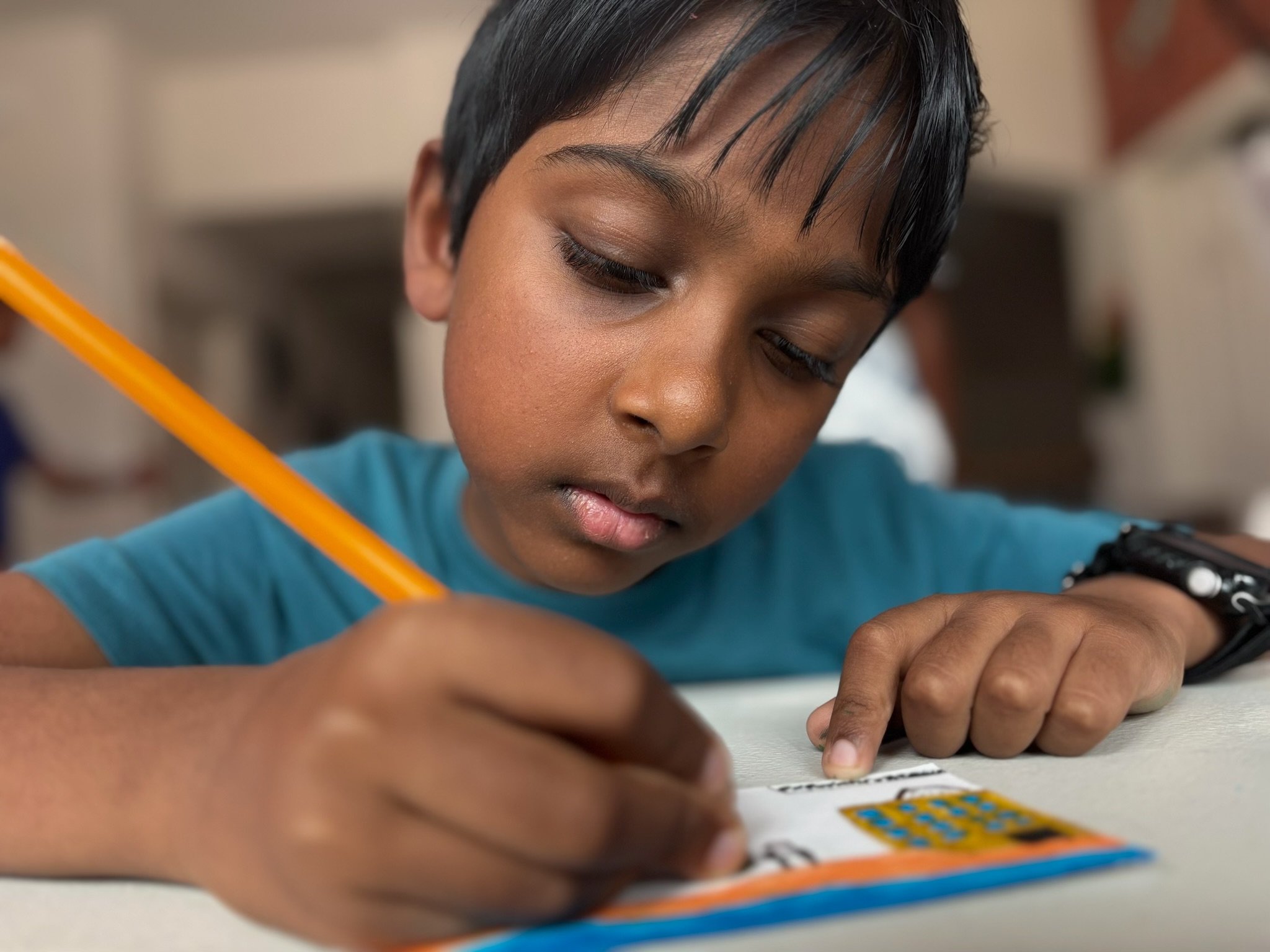A student focused on a hands-on activity